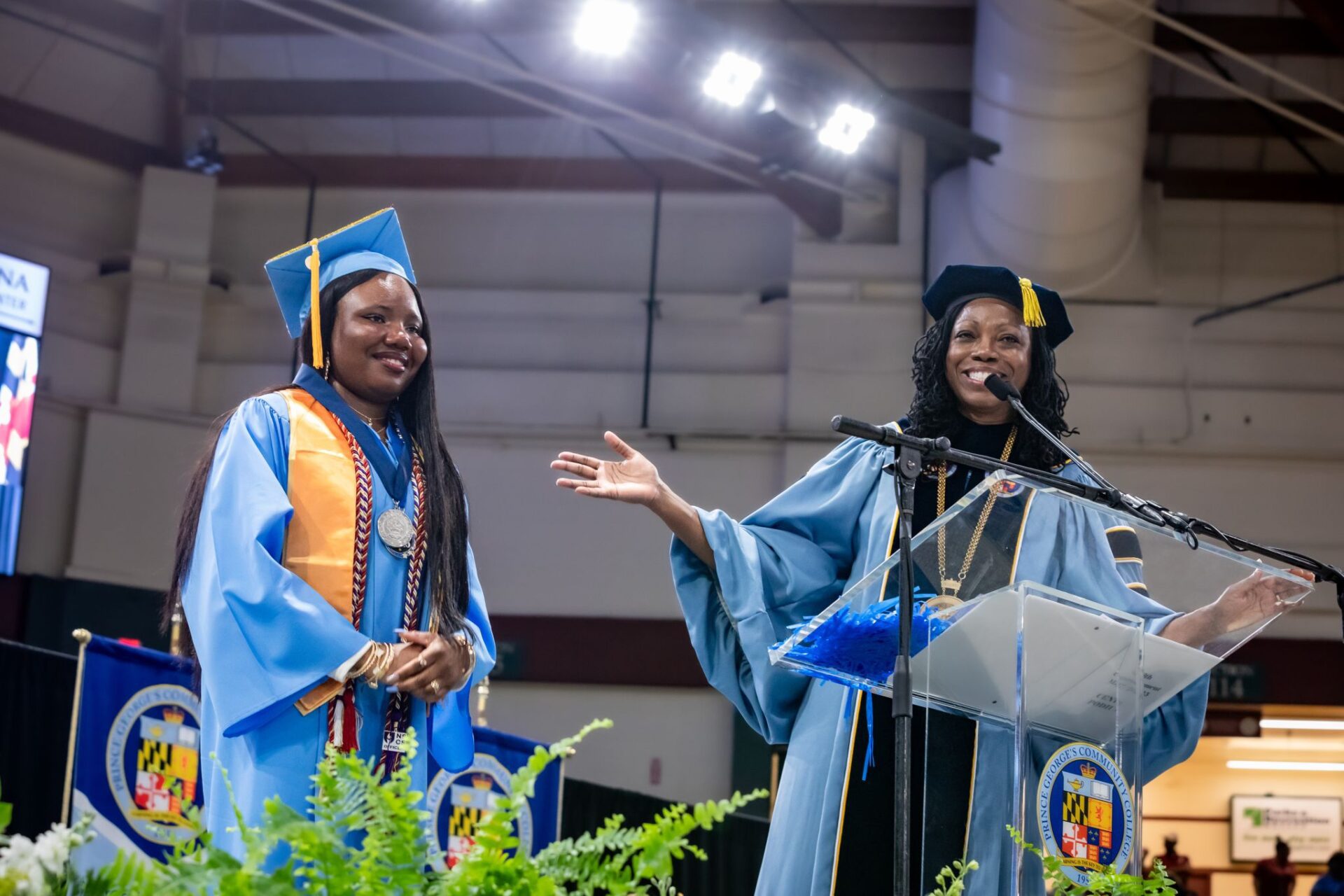 1747739474516 Ahnora Ozor receiving the Founder's Medal from President of Prince George Community College, Falecia D. Williams.