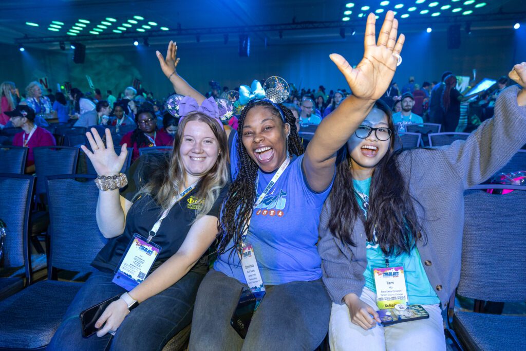 Three students celebrating at PTK Catalyst 2024.